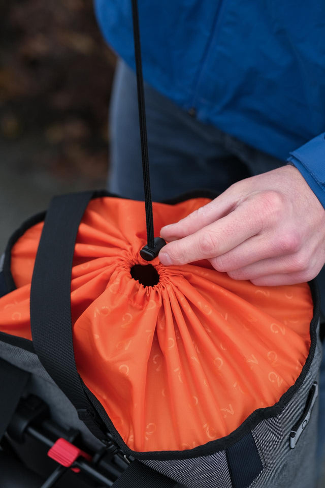 Two Wheel Gear Grey Solo Market Pannier  attached to bicycle being tightened