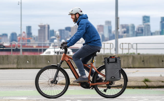 Two Wheel Gear Grey Solo Market Pannier  attached to electric bicycle with bike commuter