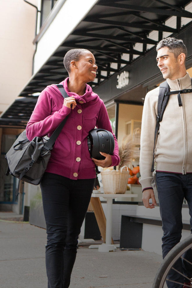 Woman with Two Wheel Gear Bicycle Bag at the shops